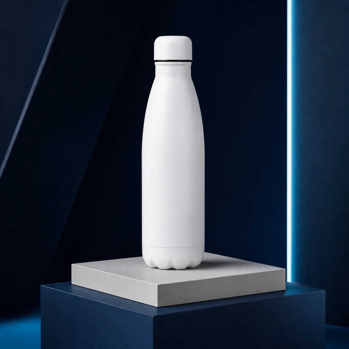 Insulated bottle in a navy studio campaign setting